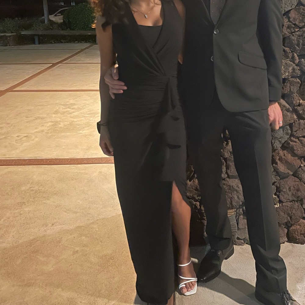Elegant fitted long dress with a small tail